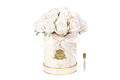 Blush rose buds in a pink hat box flower diffuser