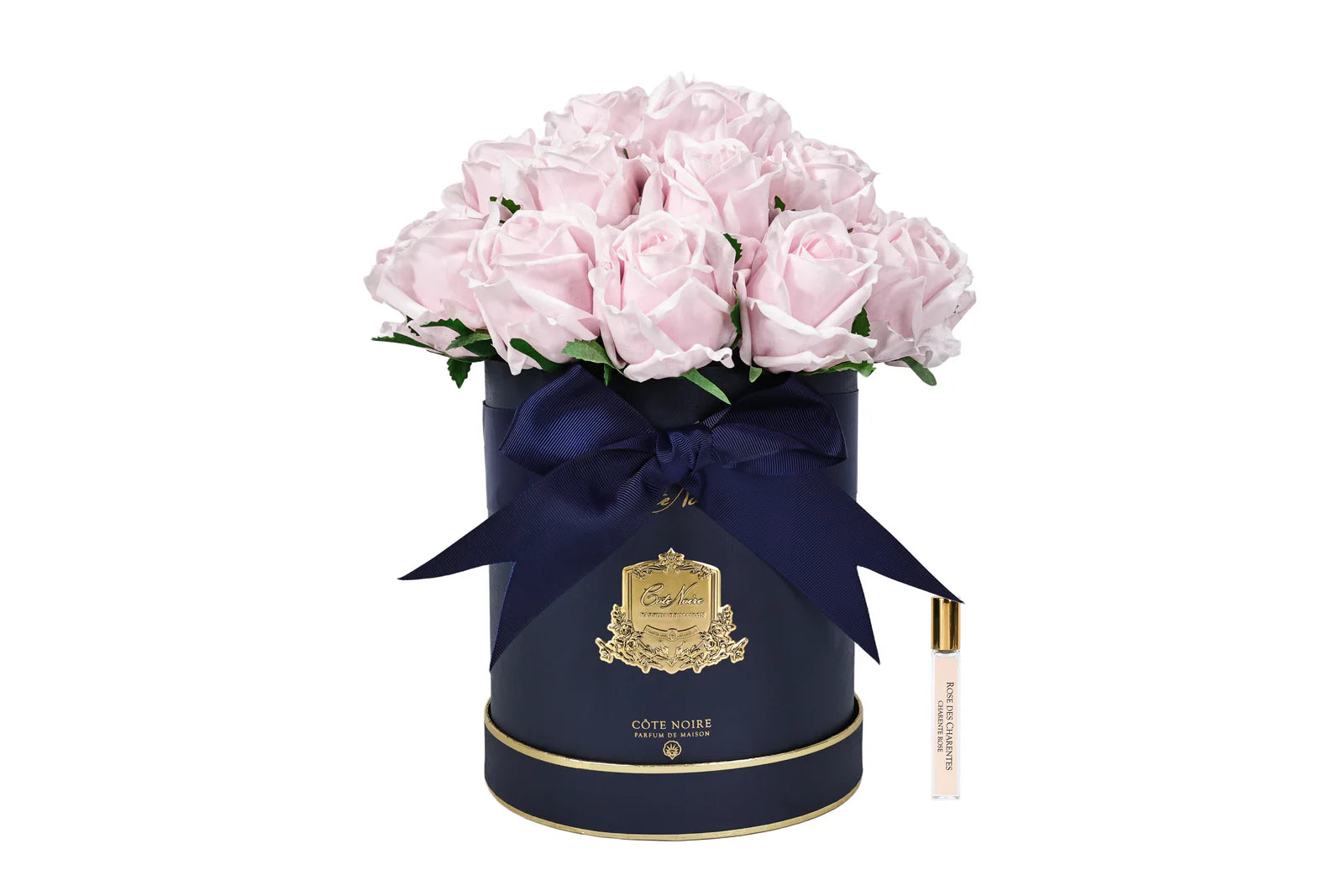 Pink roses in a navy hat box flower diffuser