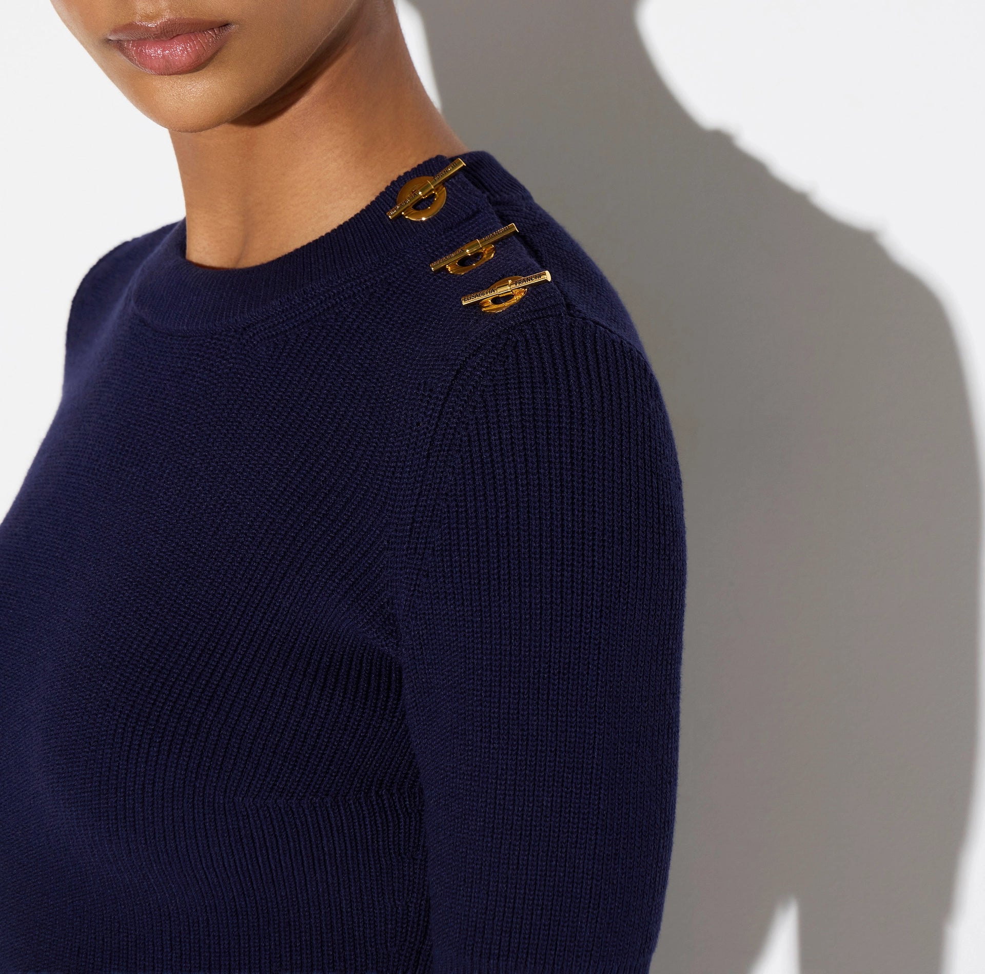 Navy cotton knit top with gold T-bars
