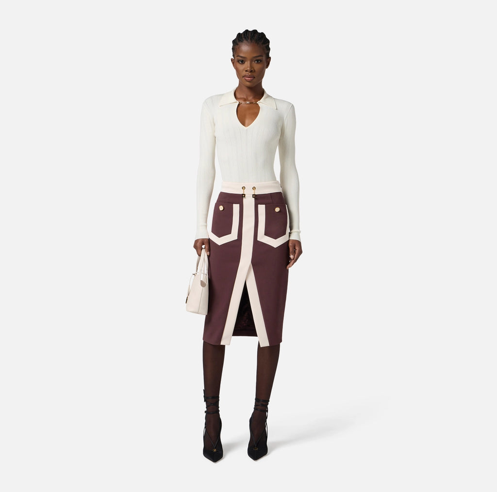 Ivory rib knit long sleeve top with gold embelishment