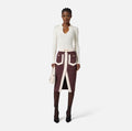 Ivory rib knit long sleeve top with gold embelishment