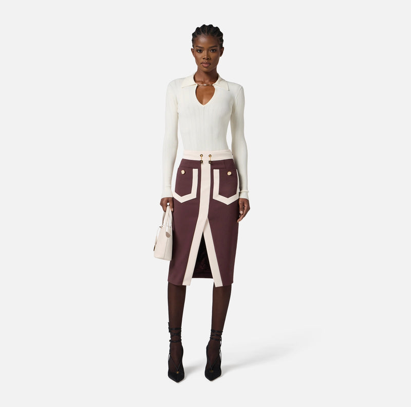 Ivory rib knit long sleeve top with gold embelishment