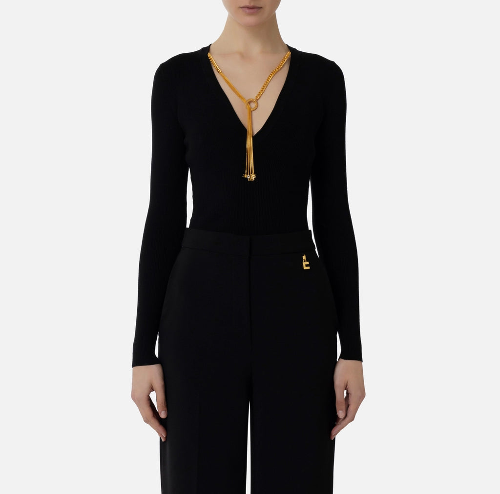 Black rib knit top with necklace