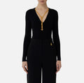 Black rib knit top with necklace