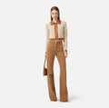 Ivory brown knit jacket with leather trimming and a zipper