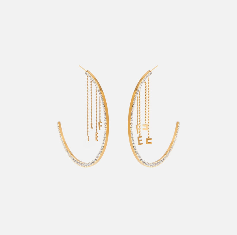 Gold hoop earrings with charms