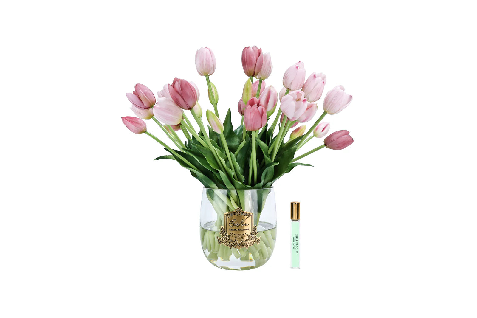 Pink heritage tulips in a clear vase with gold badge