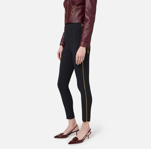 Black skinny trousers with zipper on the sides