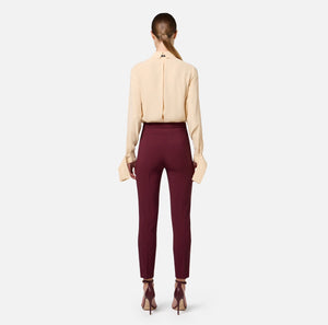 Burgundy ankle straight trousers with gold buttons