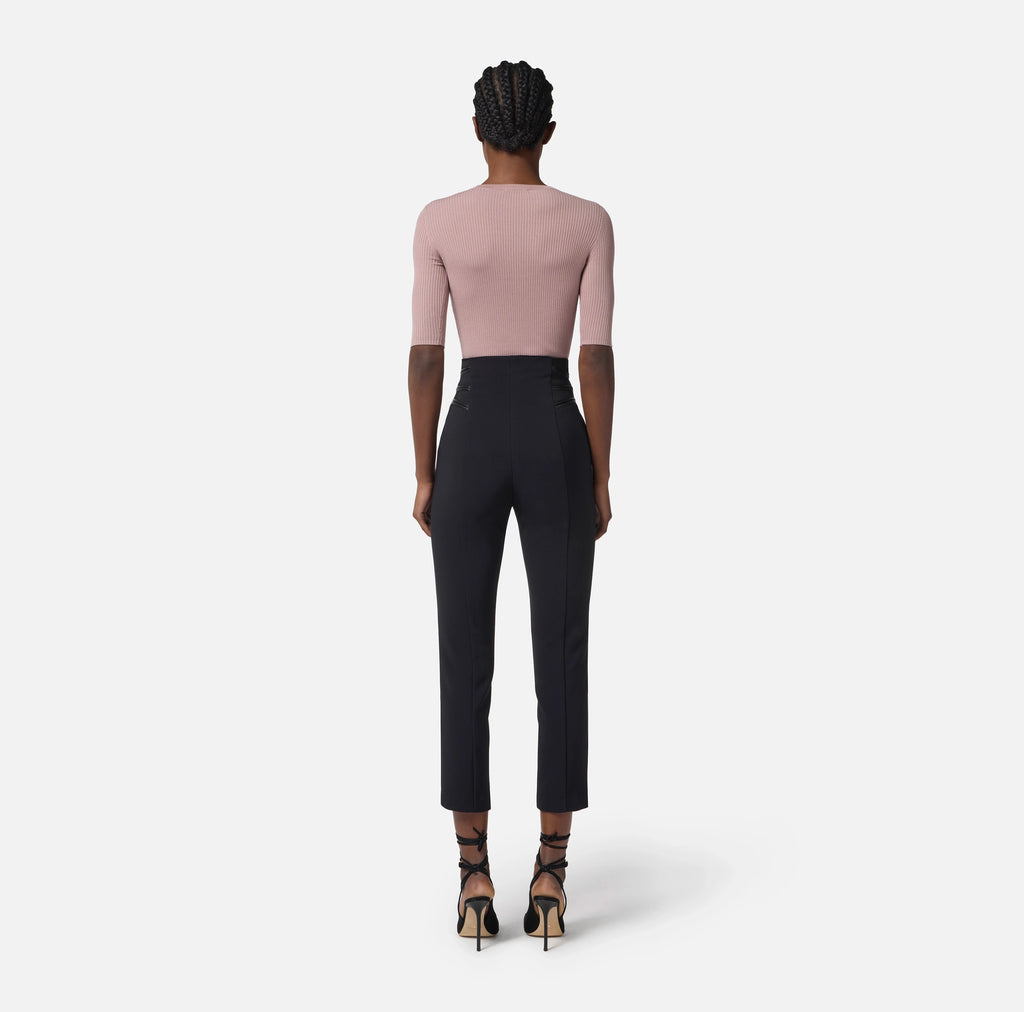 Black trousers with zipper accents