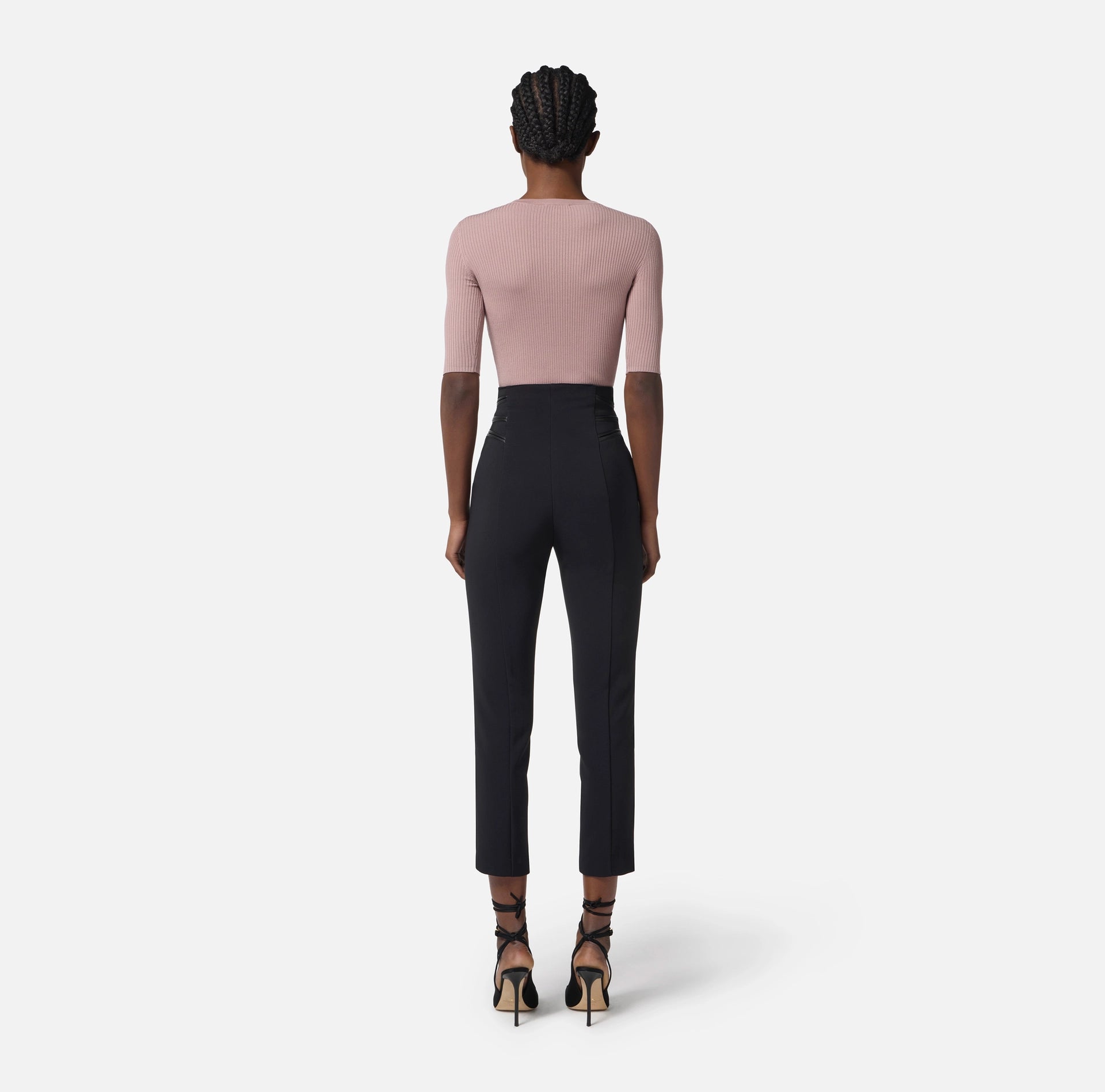 Black trousers with zipper accents