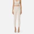 Ivory ankle slim fit pants with decorative pockets