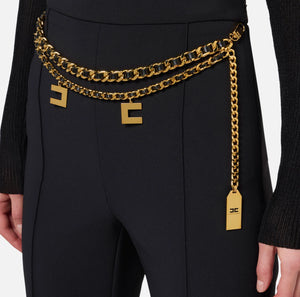 Black straight pants with chain belt