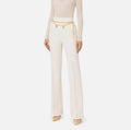 Ivory palazzo trousers with chain belt