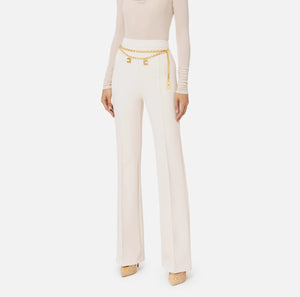 Ivory palazzo trousers with chain belt