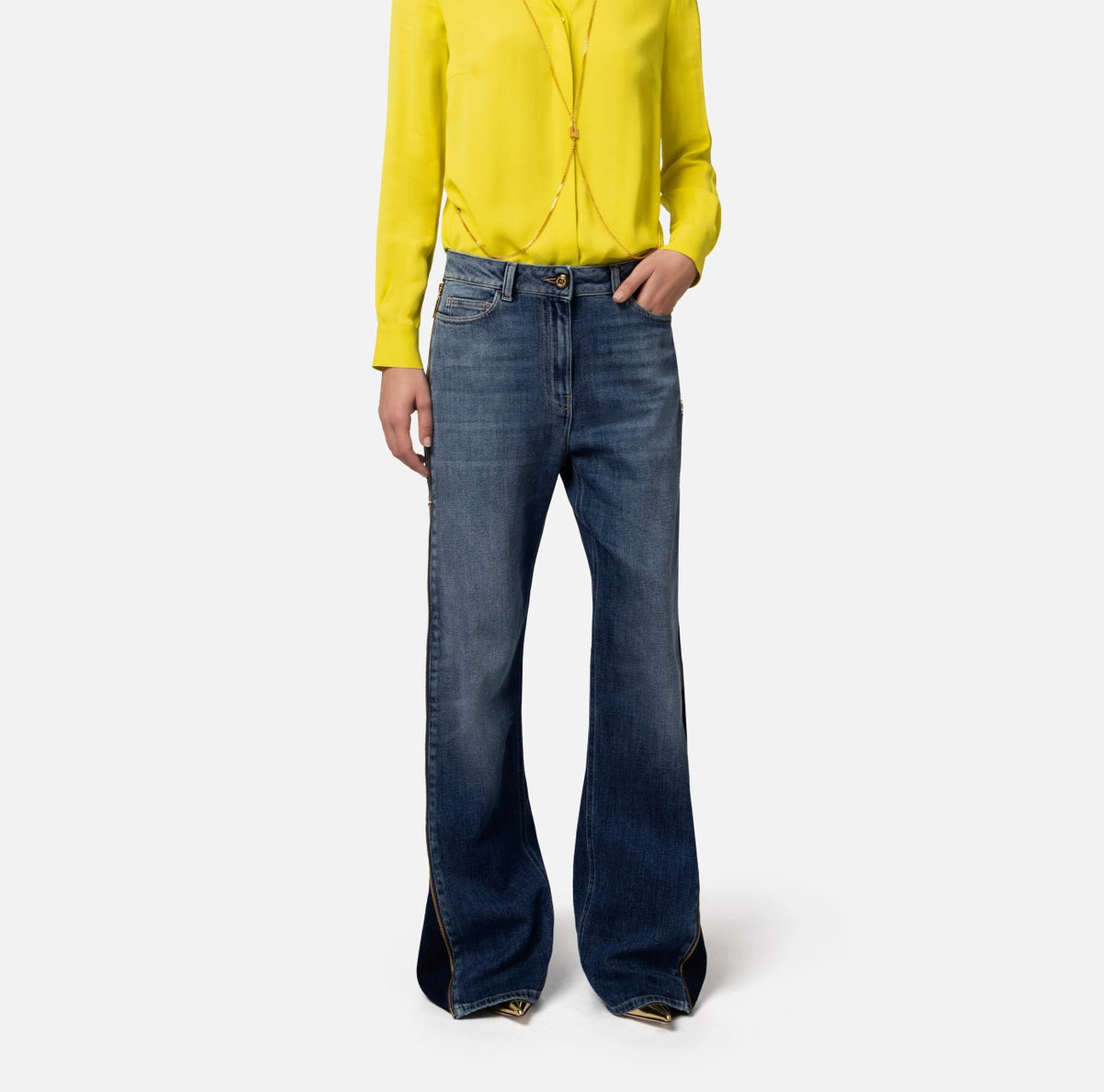 Denim jeans with zippers on the sides