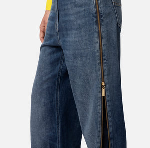 Denim jeans with zippers on the sides