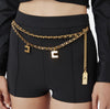 Black high waisted shorts with chain belt