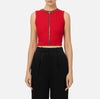 Red sleeveless knit top with chain detail