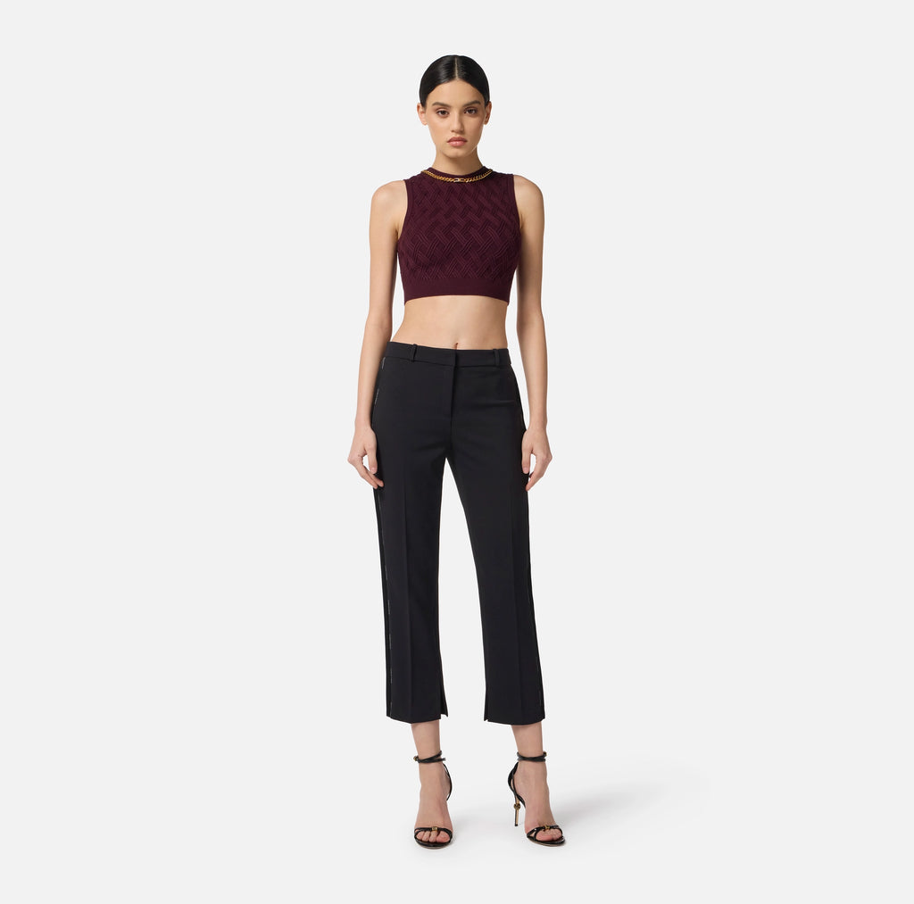 Burgundy knit top with gold chain