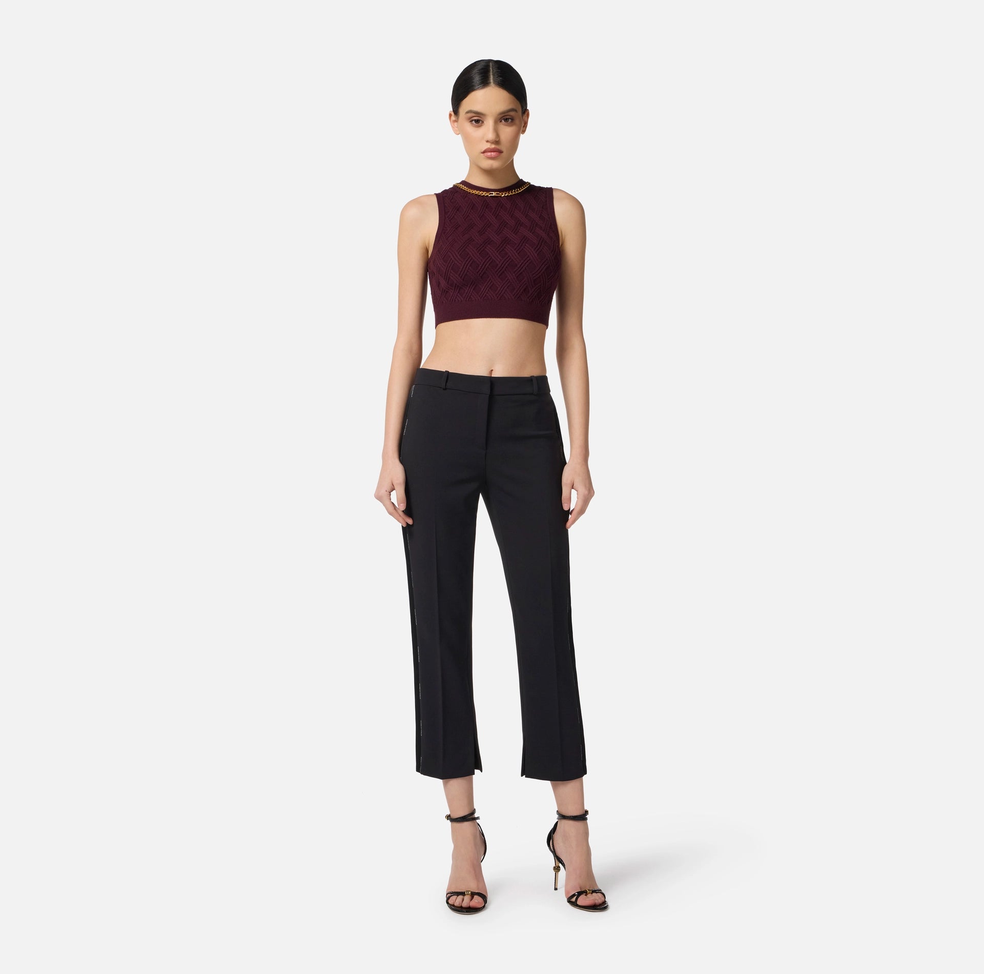Burgundy knit top with gold chain