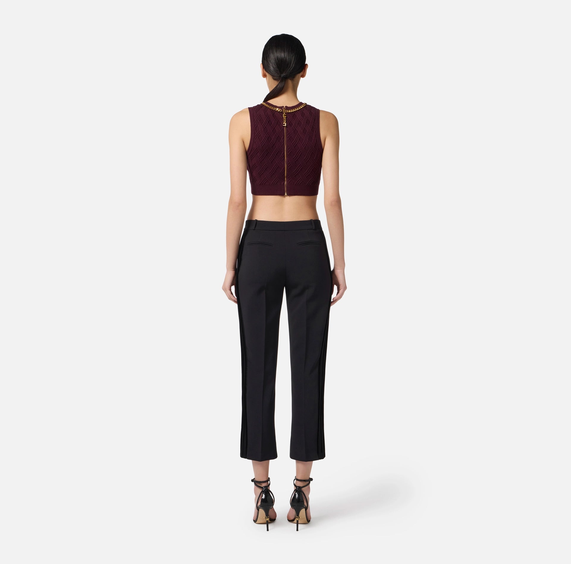 Burgundy knit top with gold chain
