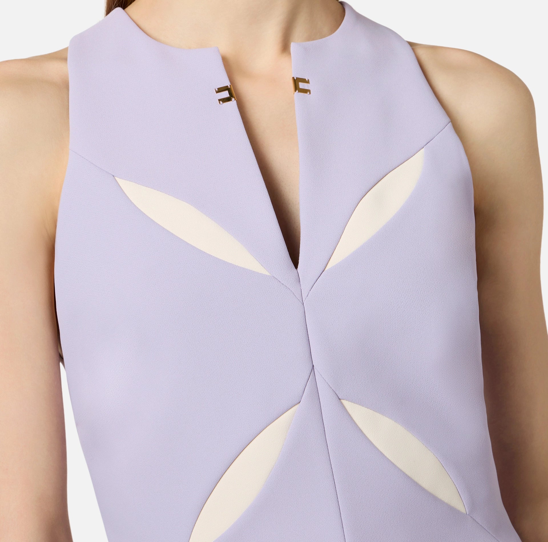 Lilac sleeveless top with ivory cutouts