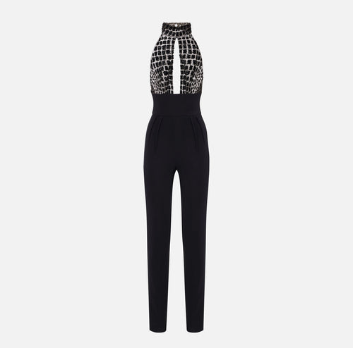 Black jumpsuit in tulle with crocodile embroideries