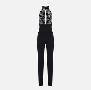Black jumpsuit in tulle with crocodile embroideries