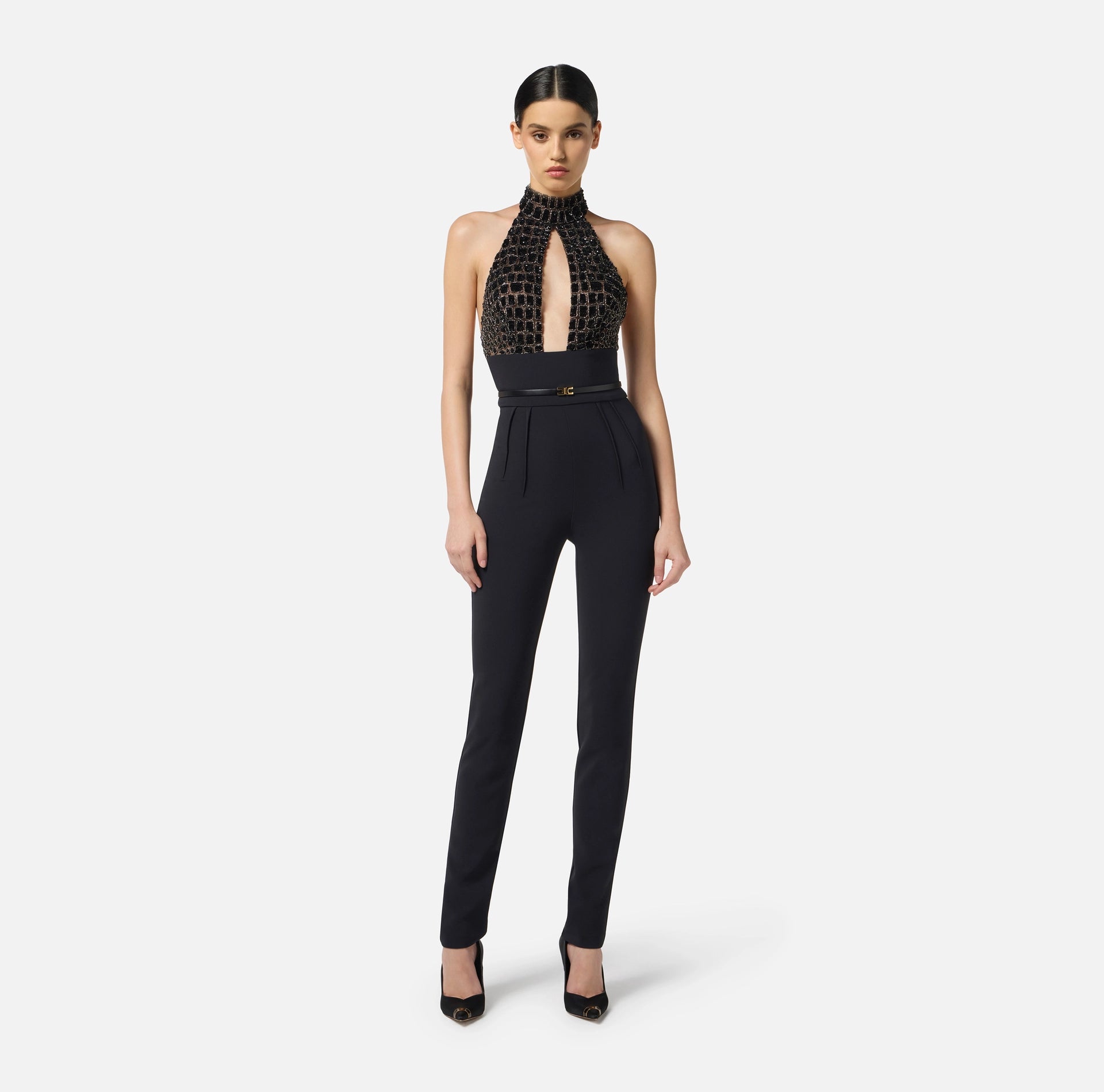 Black jumpsuit in tulle with crocodile embroideries