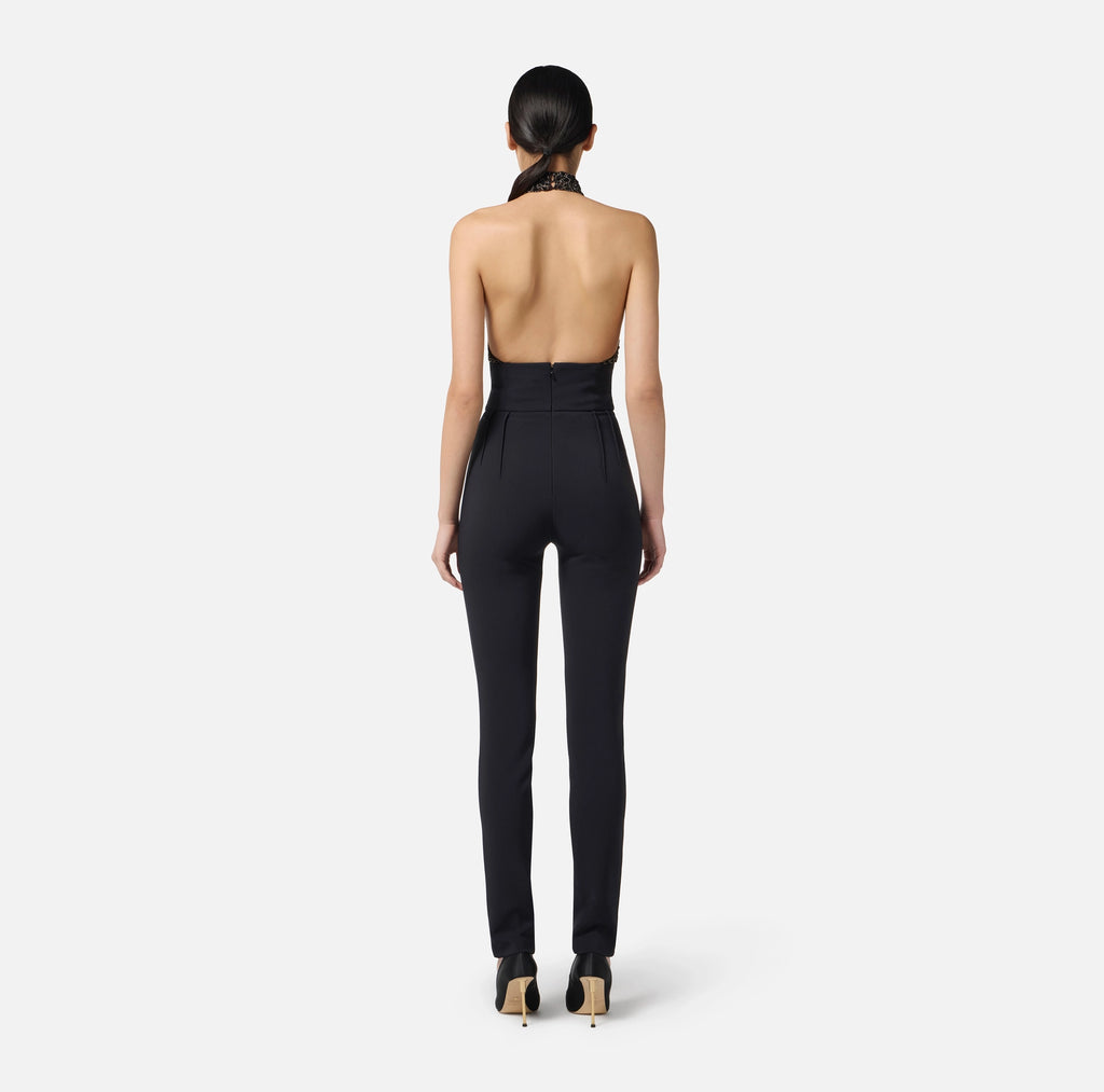 Black jumpsuit in tulle with crocodile embroideries