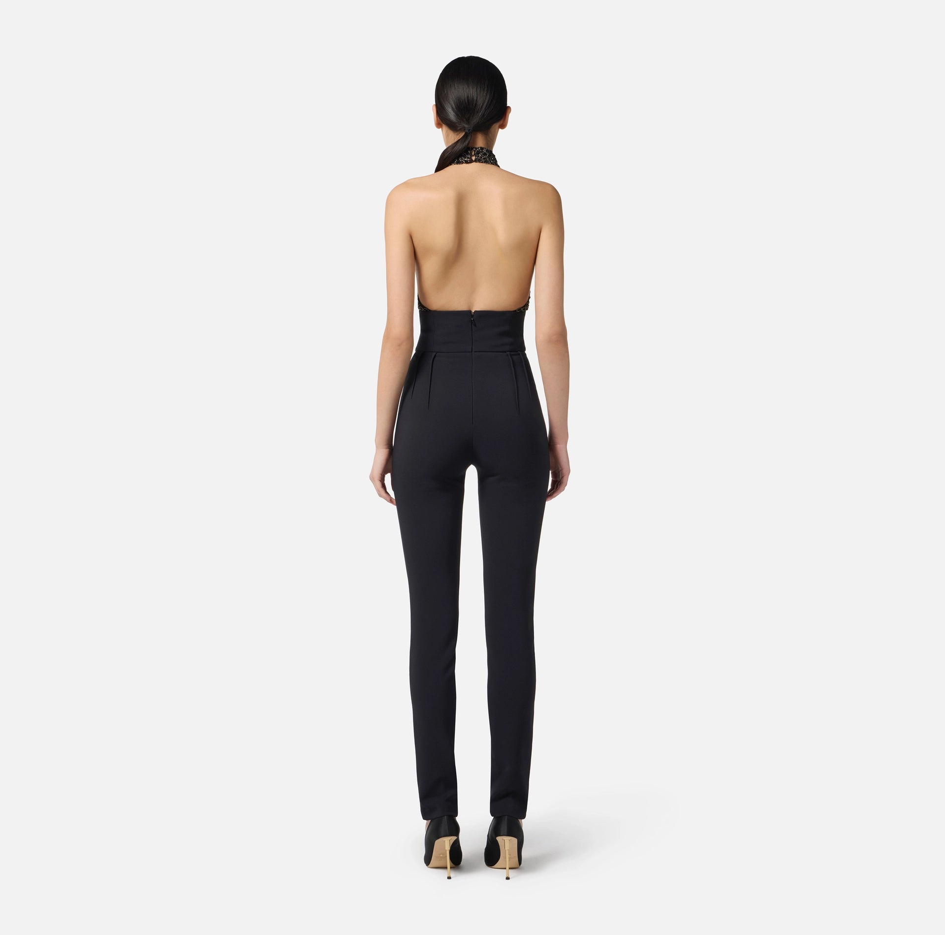 Black jumpsuit in tulle with crocodile embroideries