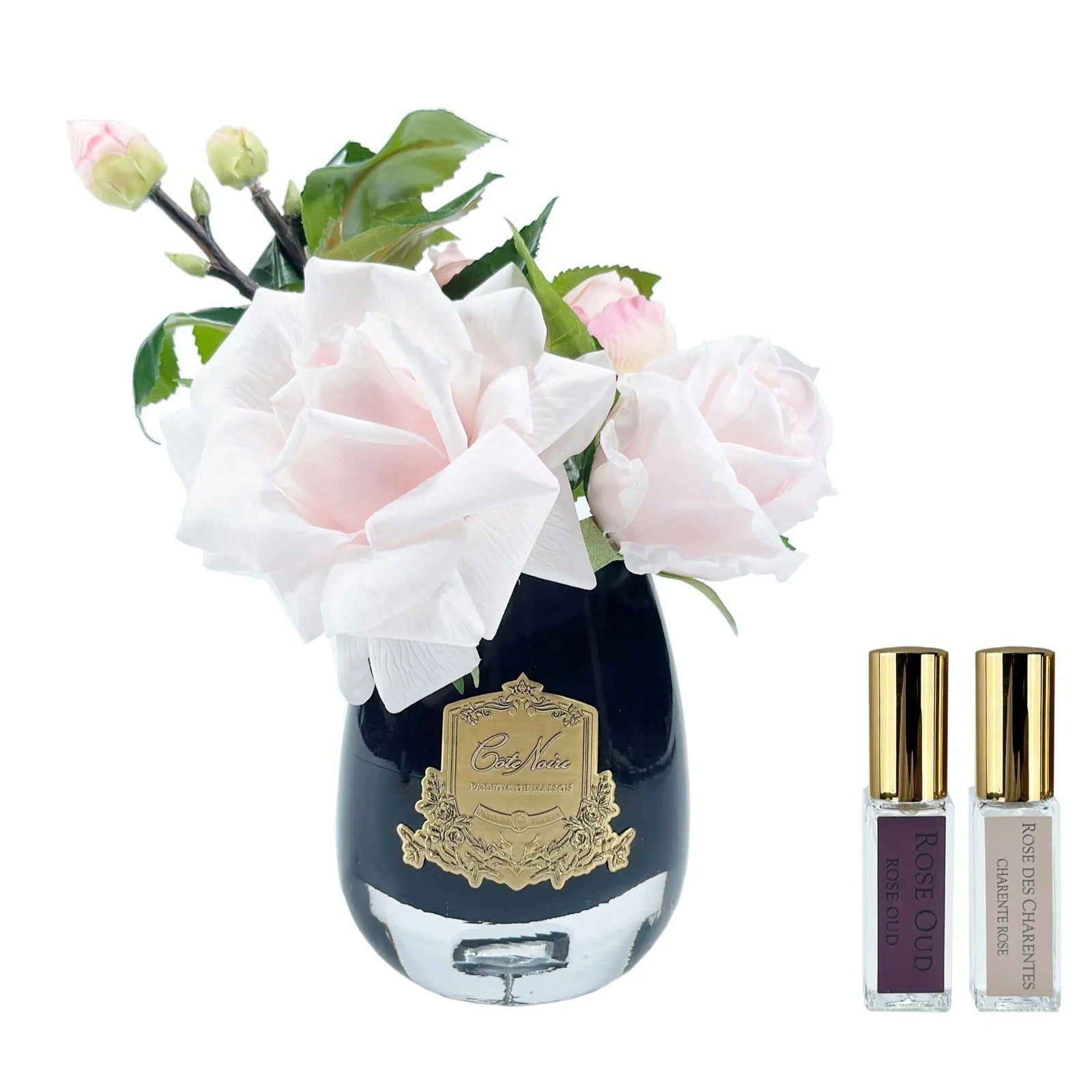 Pink tea rose in a black glass diffuser