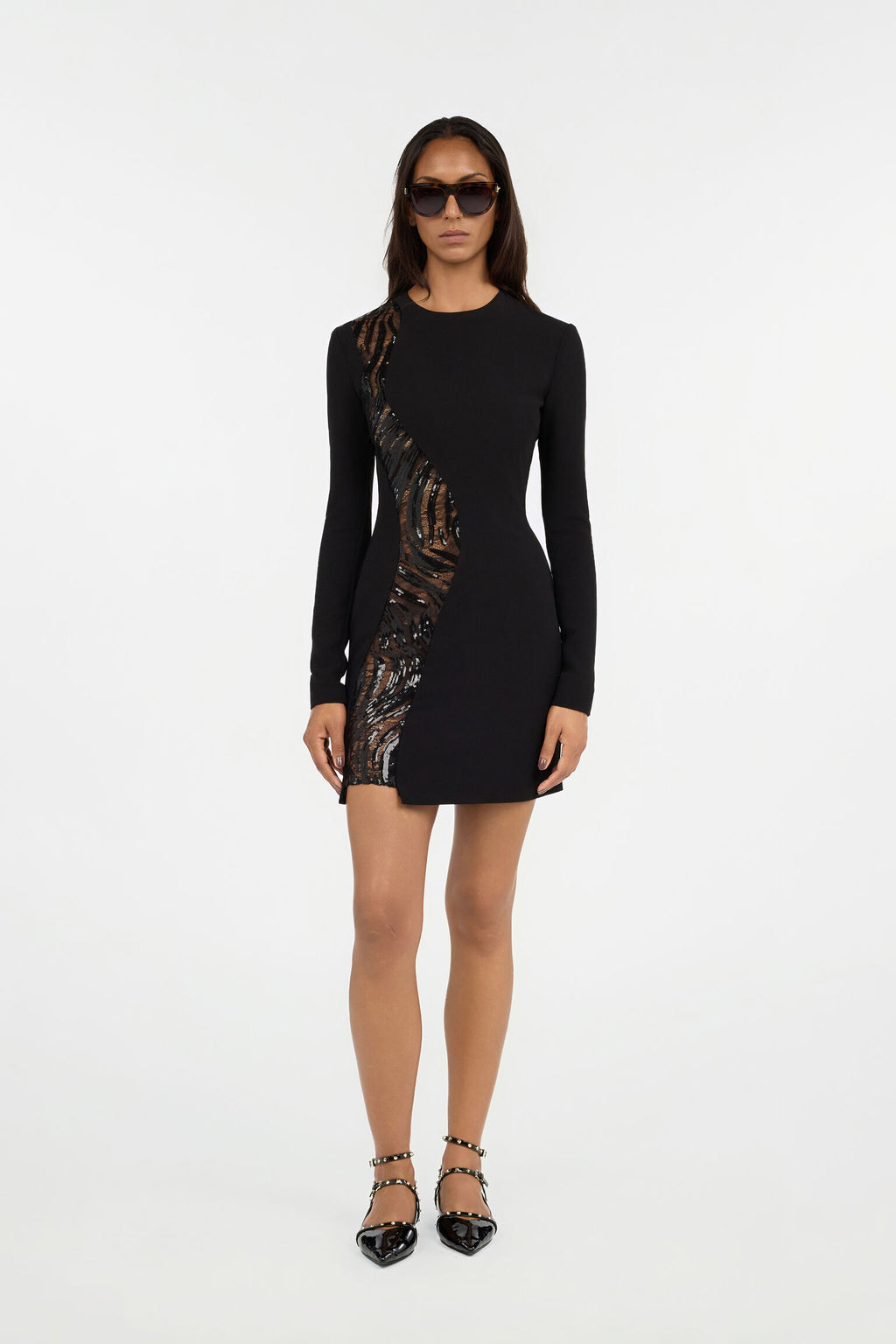 Black mini dress with long sleeves and sequin side detail