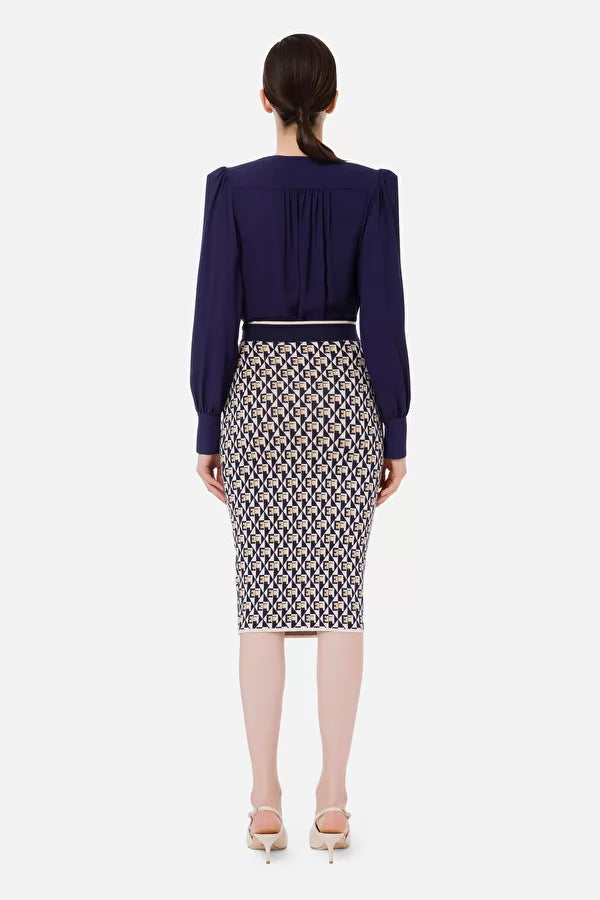 Navy blue draped bodysuit-style blouse in georgette fabric