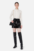 Black sequin shorts with a bow