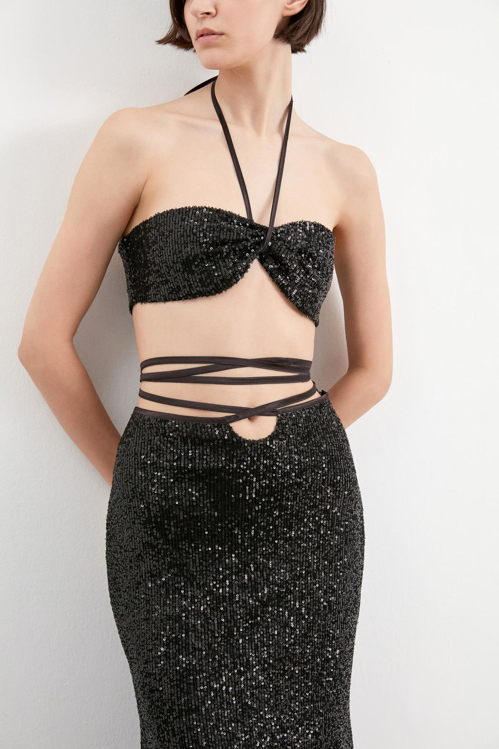 Black soft sequin pencil skirt with lacing detail