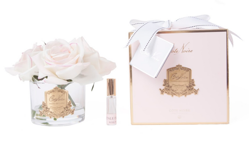 Pink blush five roses diffuser in a pink box and gold badge