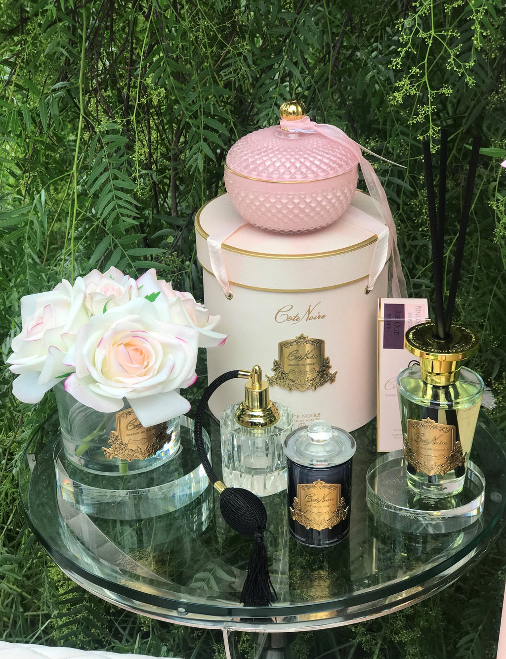 Pink blush five roses diffuser in a pink box and gold badge