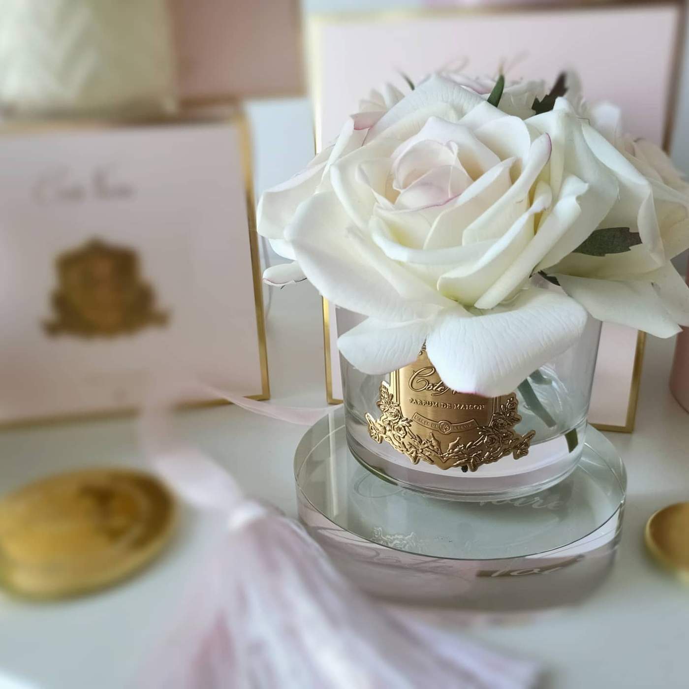 Pink blush five roses diffuser in a pink box and gold badge